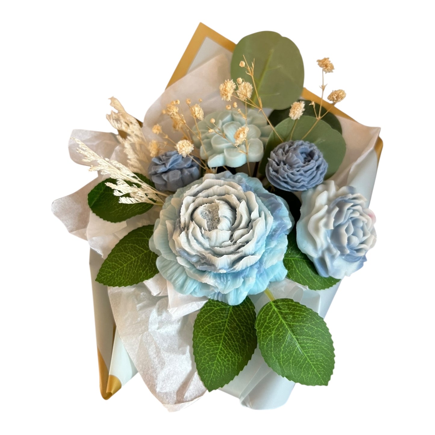 Bouquet of blue and white flowers with green leaves on a white background