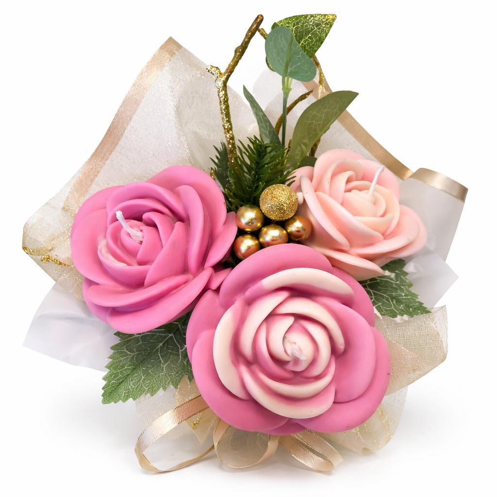 Decorative flower arrangement with pink roses and gold beads on a white background