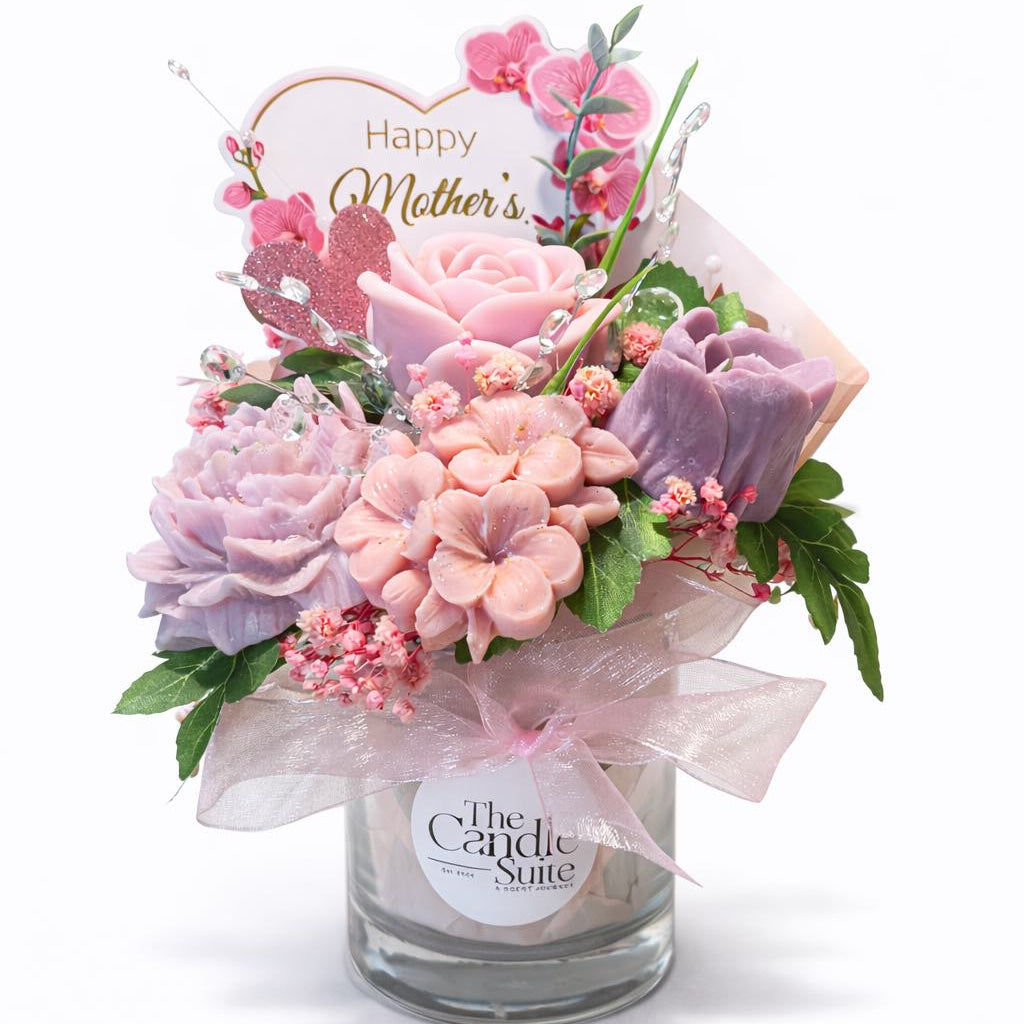 Mother’s Day floral candle bouquet gift with pink and purple wax flowers in glass jar