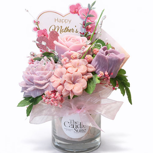 Mother’s Day floral candle bouquet gift with pink and purple wax flowers in glass jar