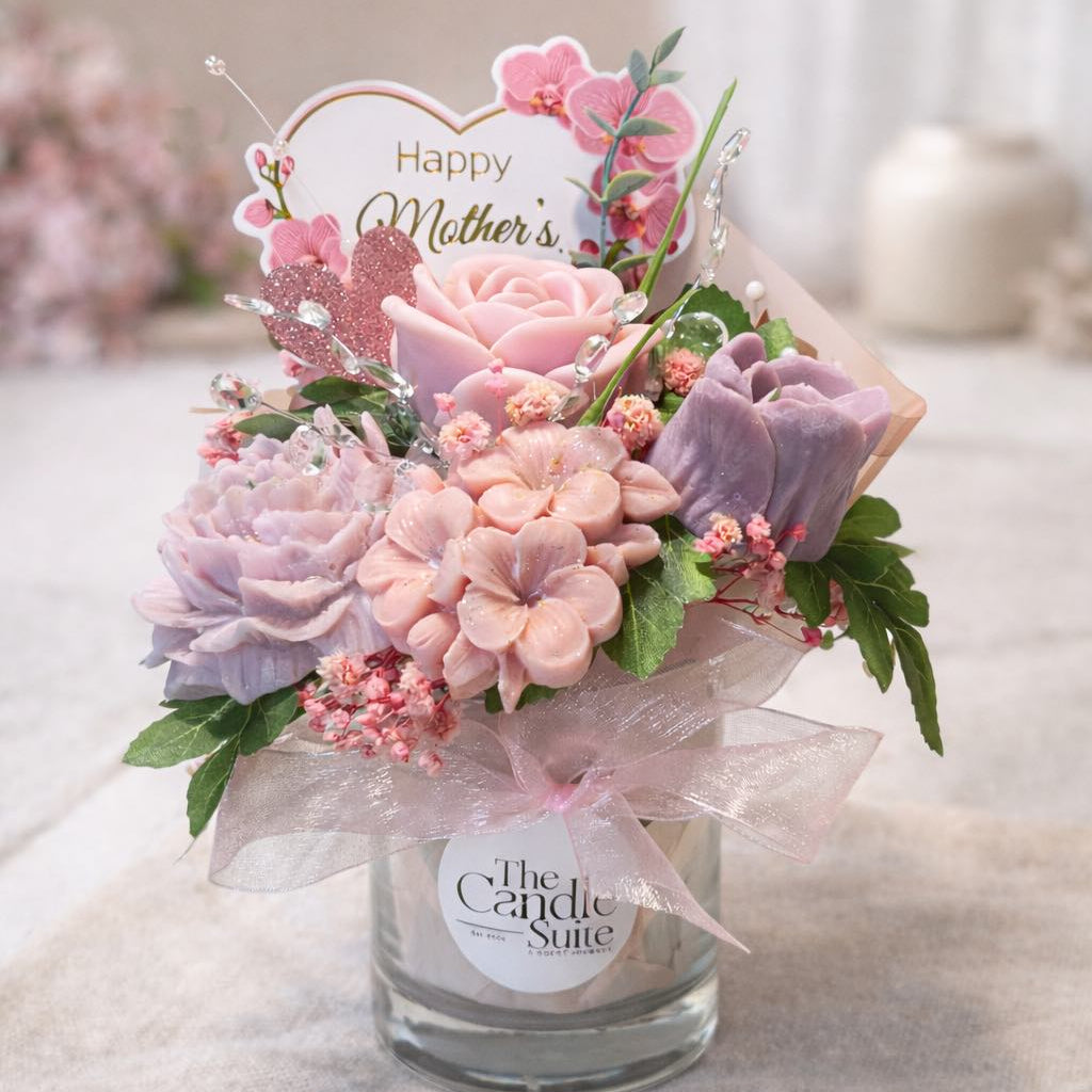 Mother’s Day floral candle bouquet gift with pink and purple wax melts, decorative flowers, and a 'Happy Mother’s Day' sign in a glass jar