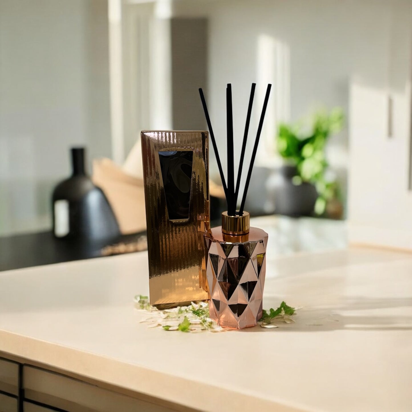 Sophisticated home diffusers in a sleek rose gold bottle, hand-poured for premium scent diffusion.