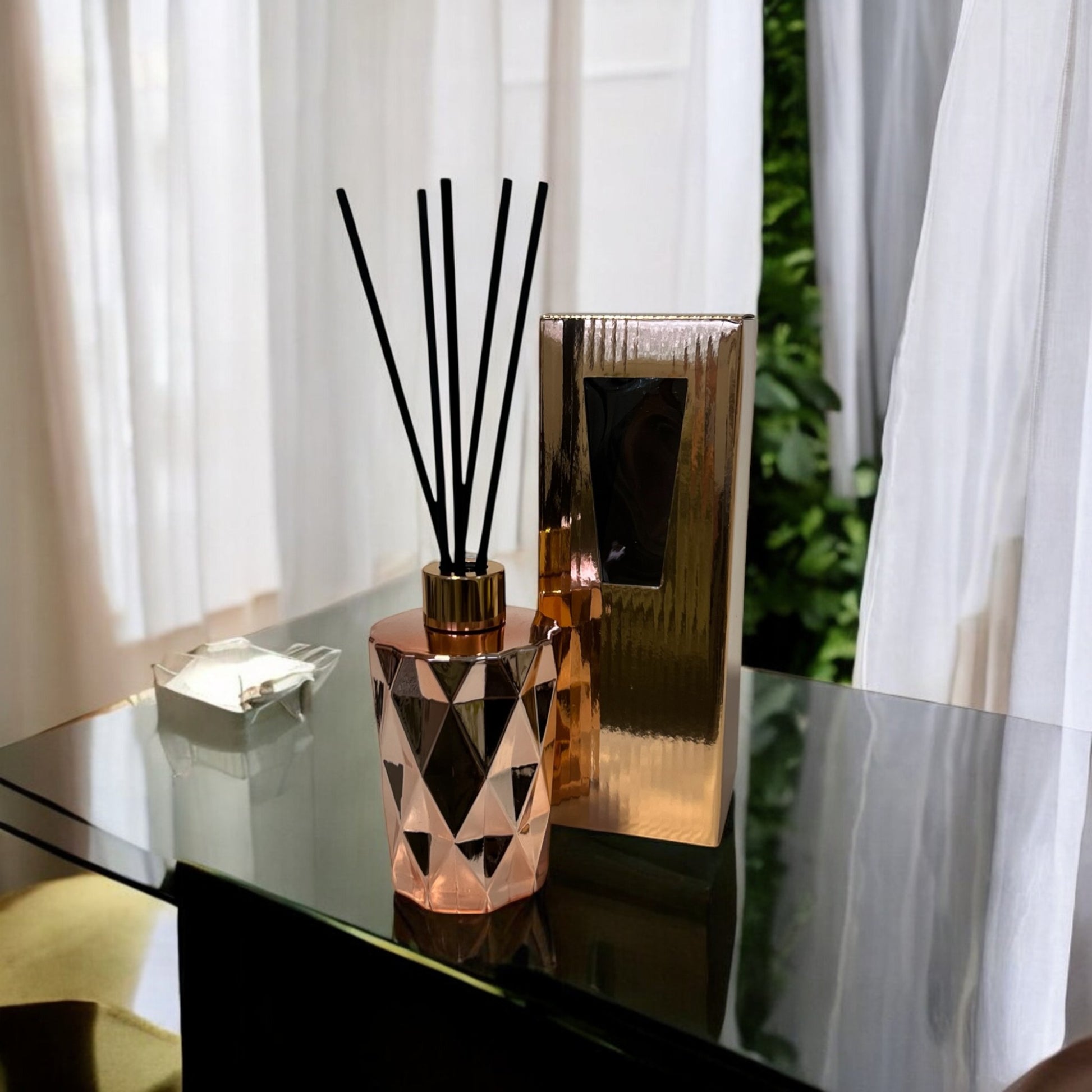 Luxury rose gold home diffusers, hand-poured with care to create a beautiful and calming environment.