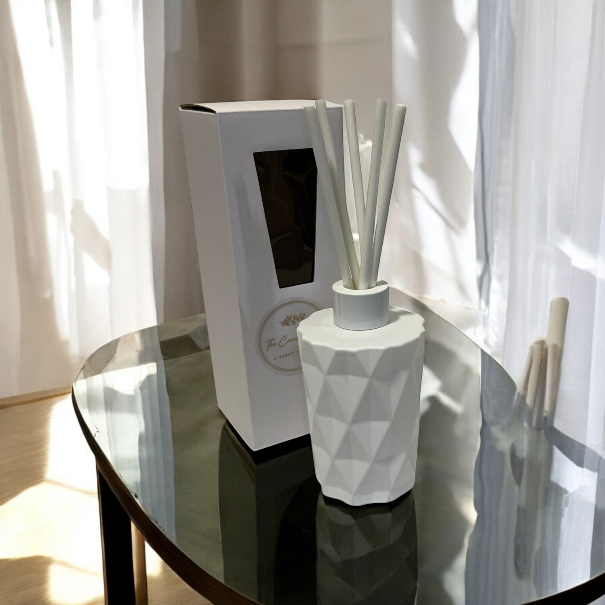 Luxury white home diffusers, hand-poured with care to create a beautiful and calming environment.