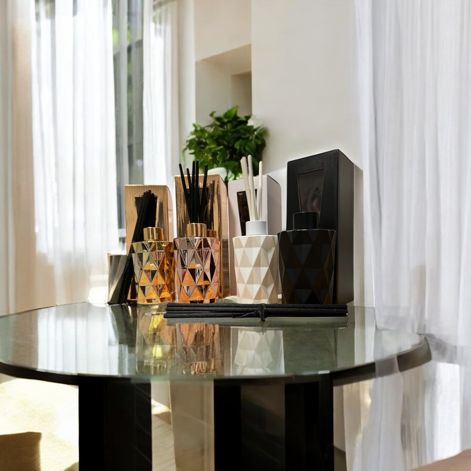 Hand-poured reed diffuser in a contemporary rose gold bottle, perfect for home fragrance and decor.