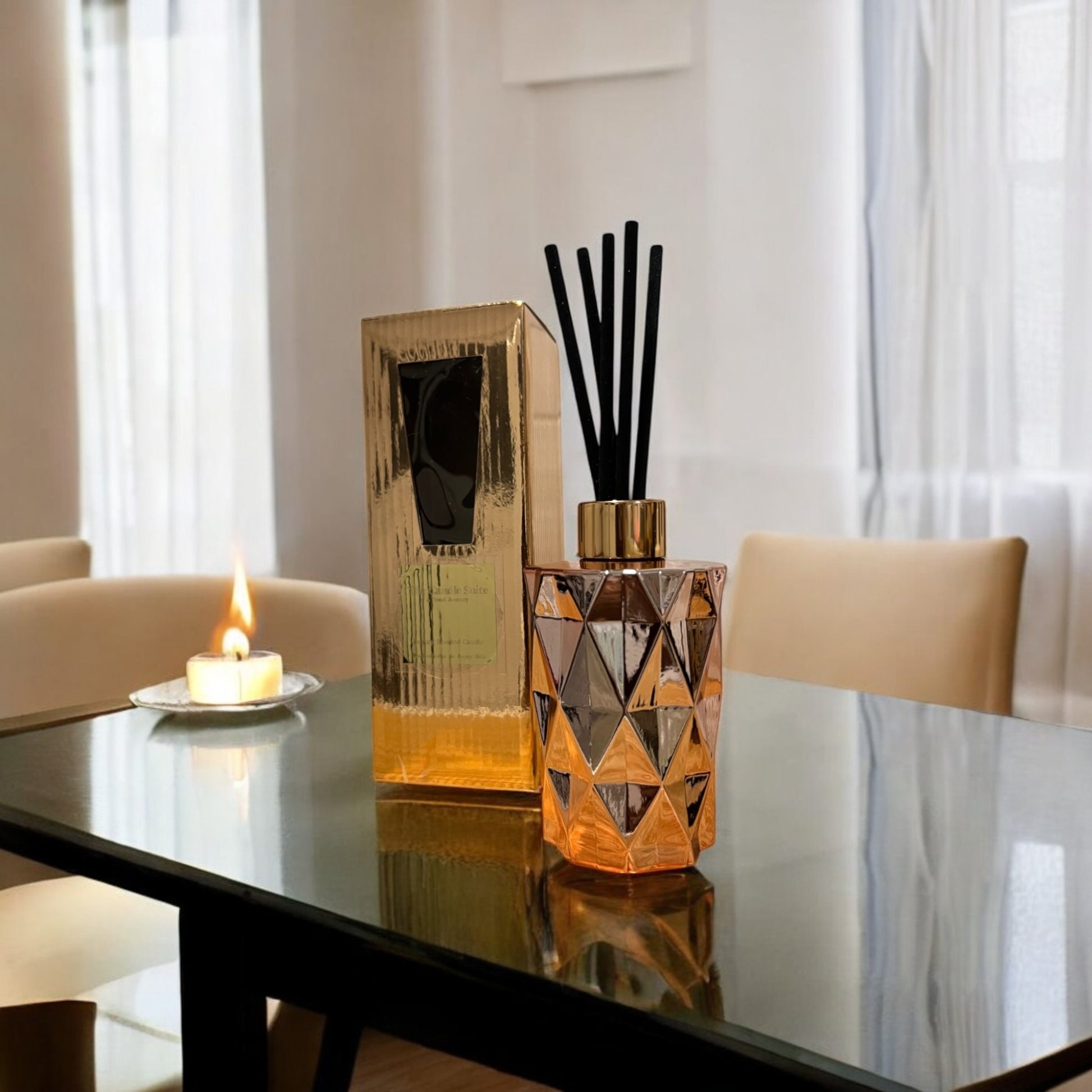 Rose gold reed diffuser in a chic, hand-poured design, delivering long-lasting fragrance with style.