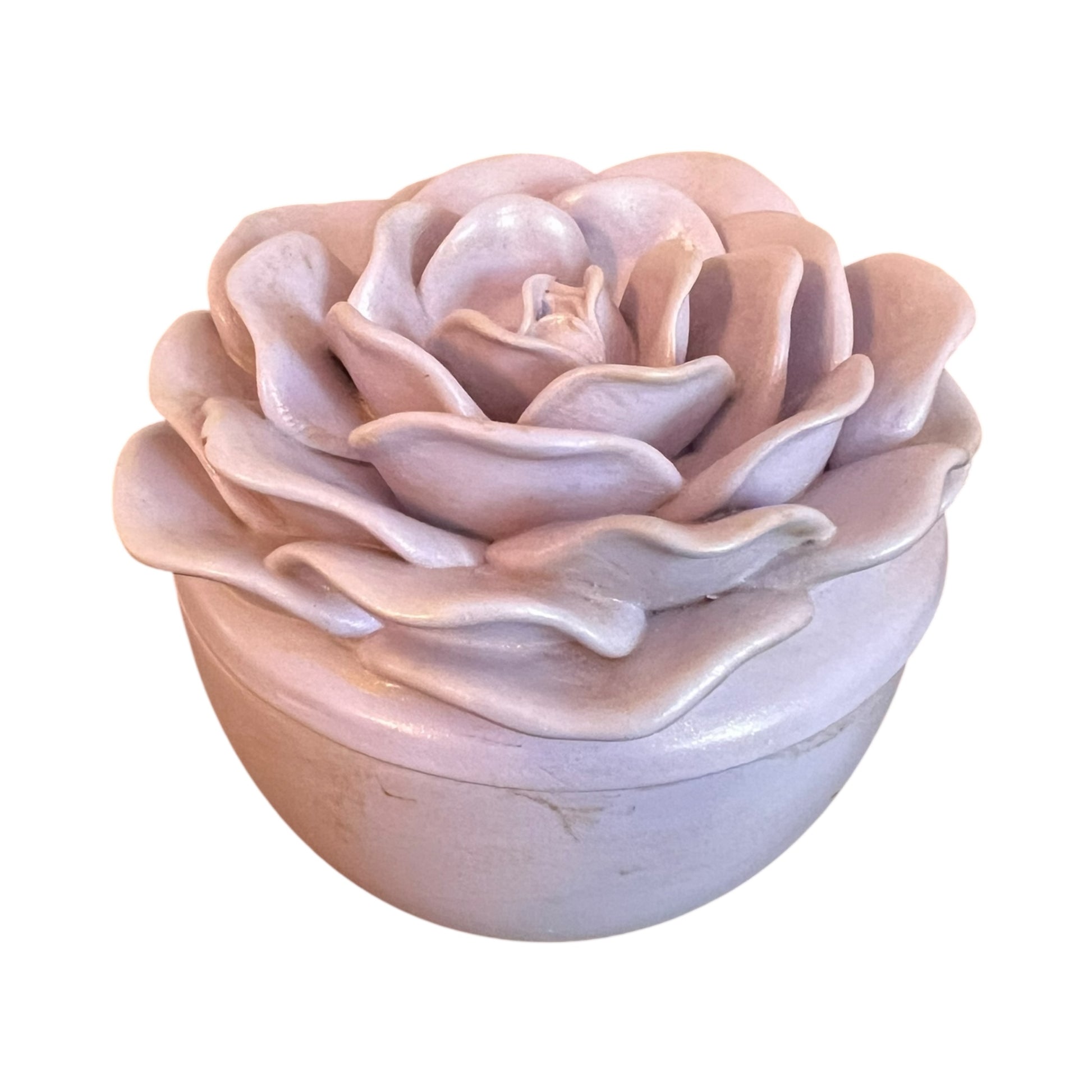 Rose-shaped ceramic container on a white background