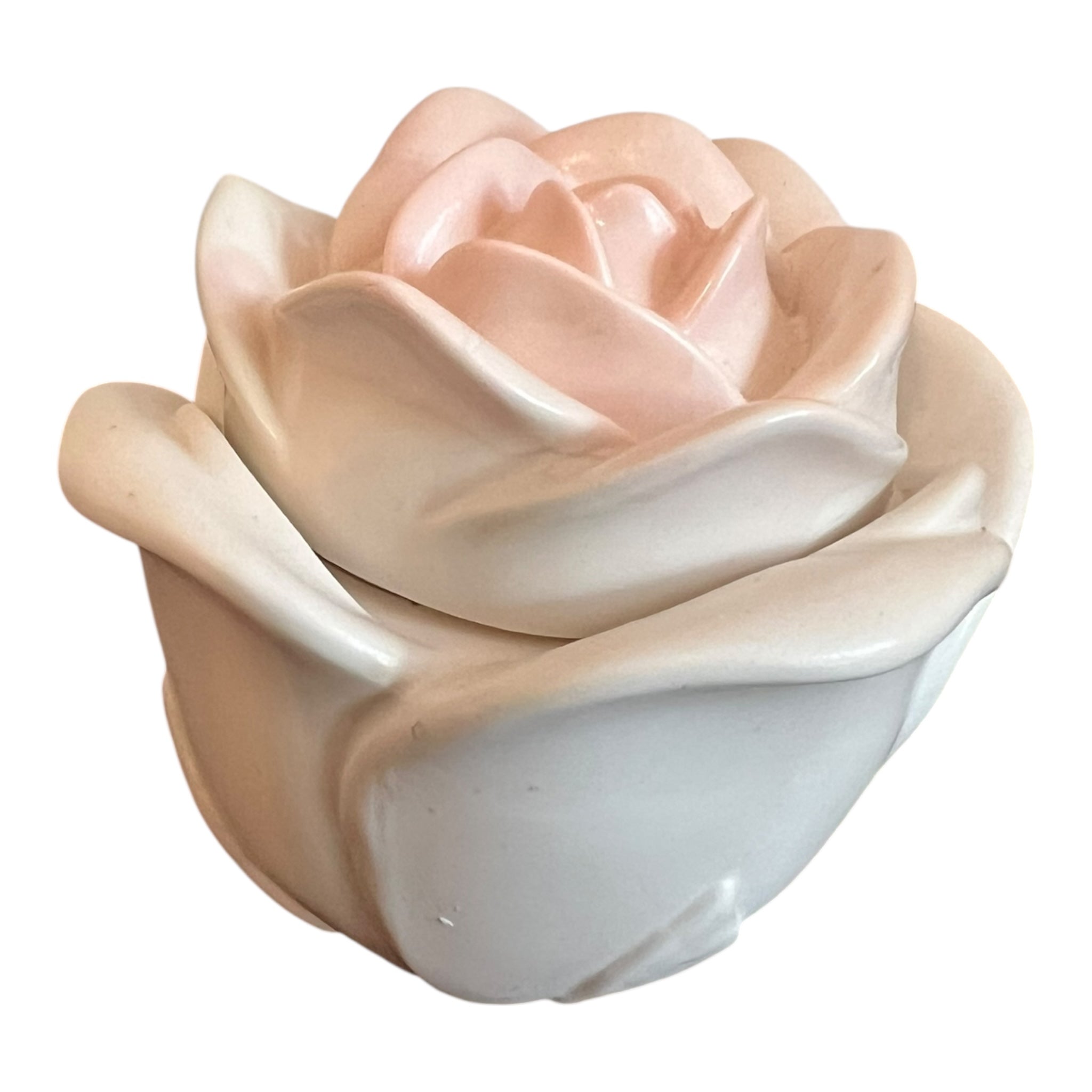 Ceramic rose-shaped object on a white background