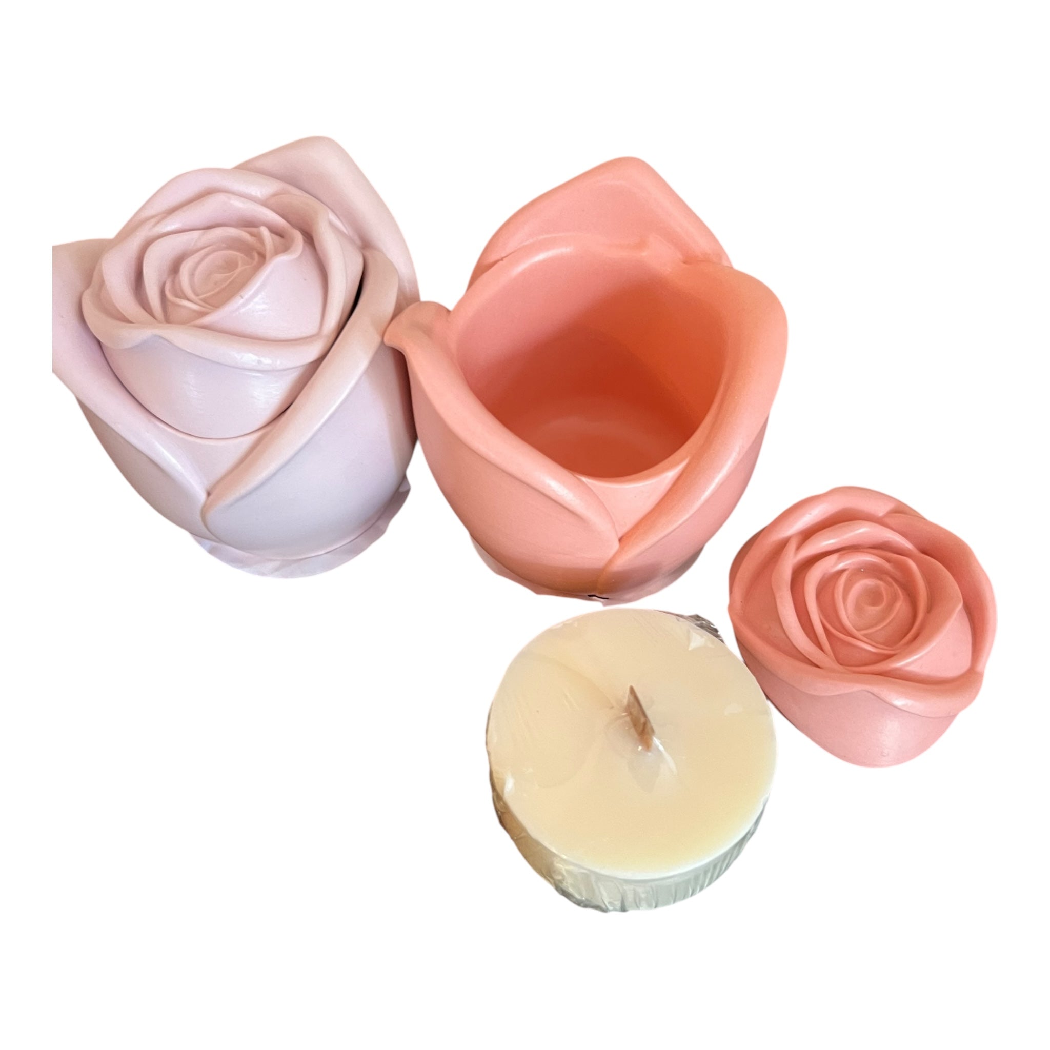 Set of rose-shaped candles on a white background