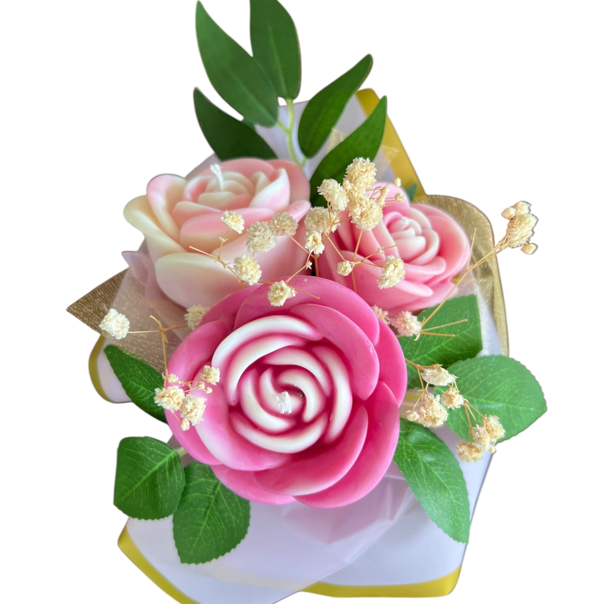 Bouquet of pink and white roses with green leaves on a white background