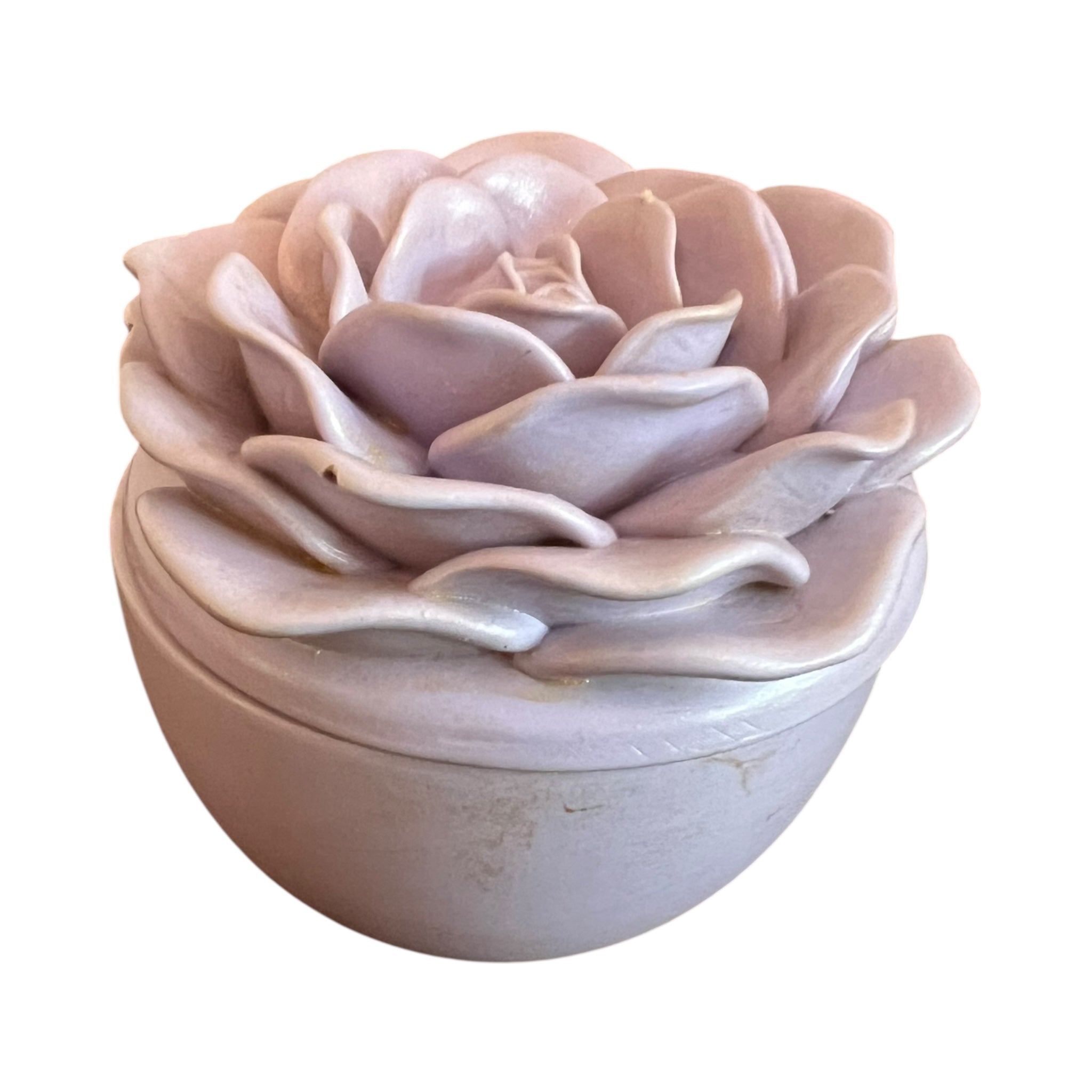 Decorative ceramic flower pot with a wavy design on a white background