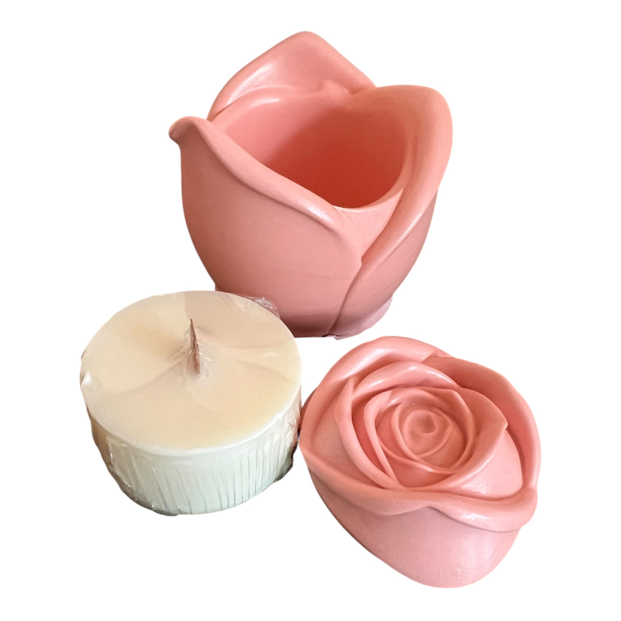 Pink rose-shaped candle mold on a white background