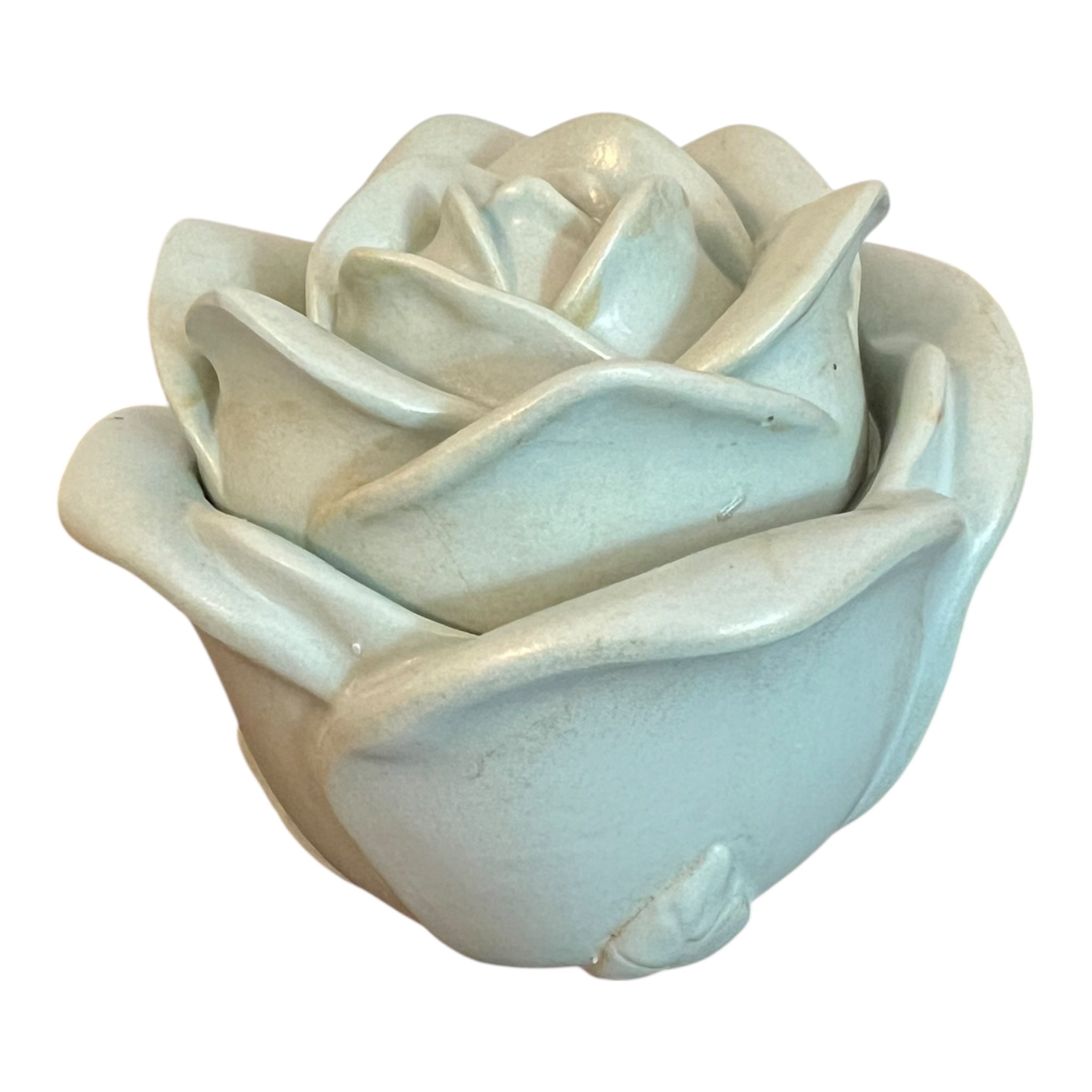 Ceramic rose-shaped planter on a white background