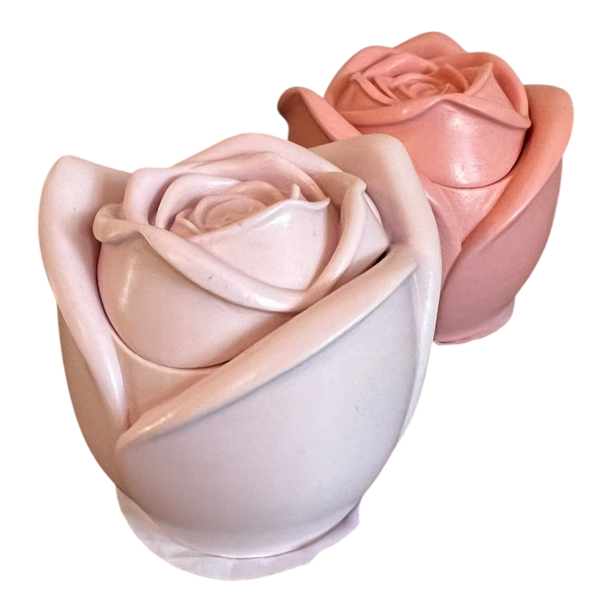 Two ceramic rose-shaped containers on a white background