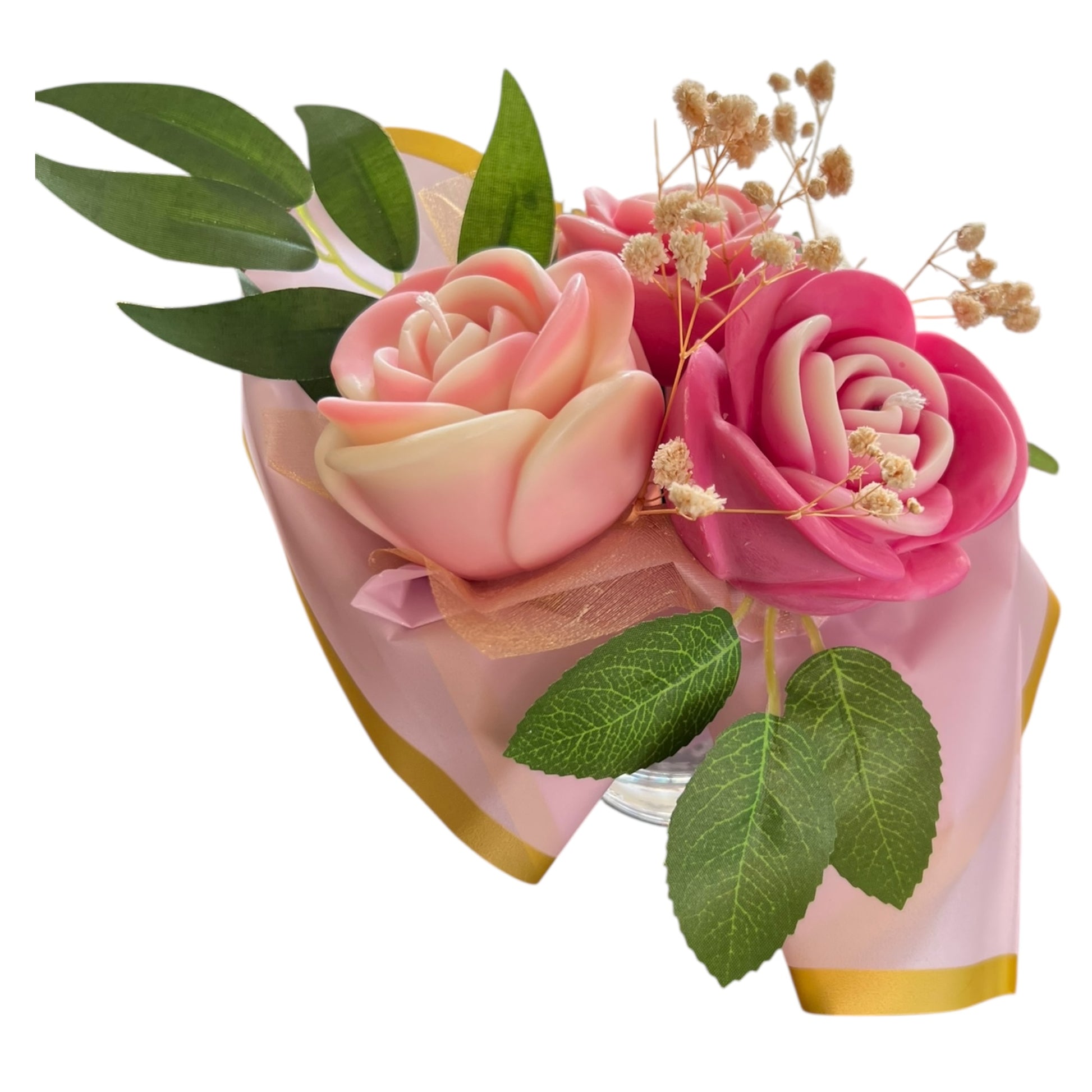 Bouquet of pink and green flowers in a decorative container on a white background