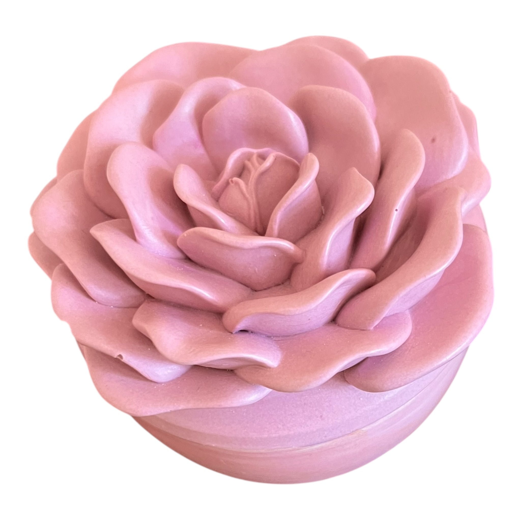 Pink rose-shaped container on a white background