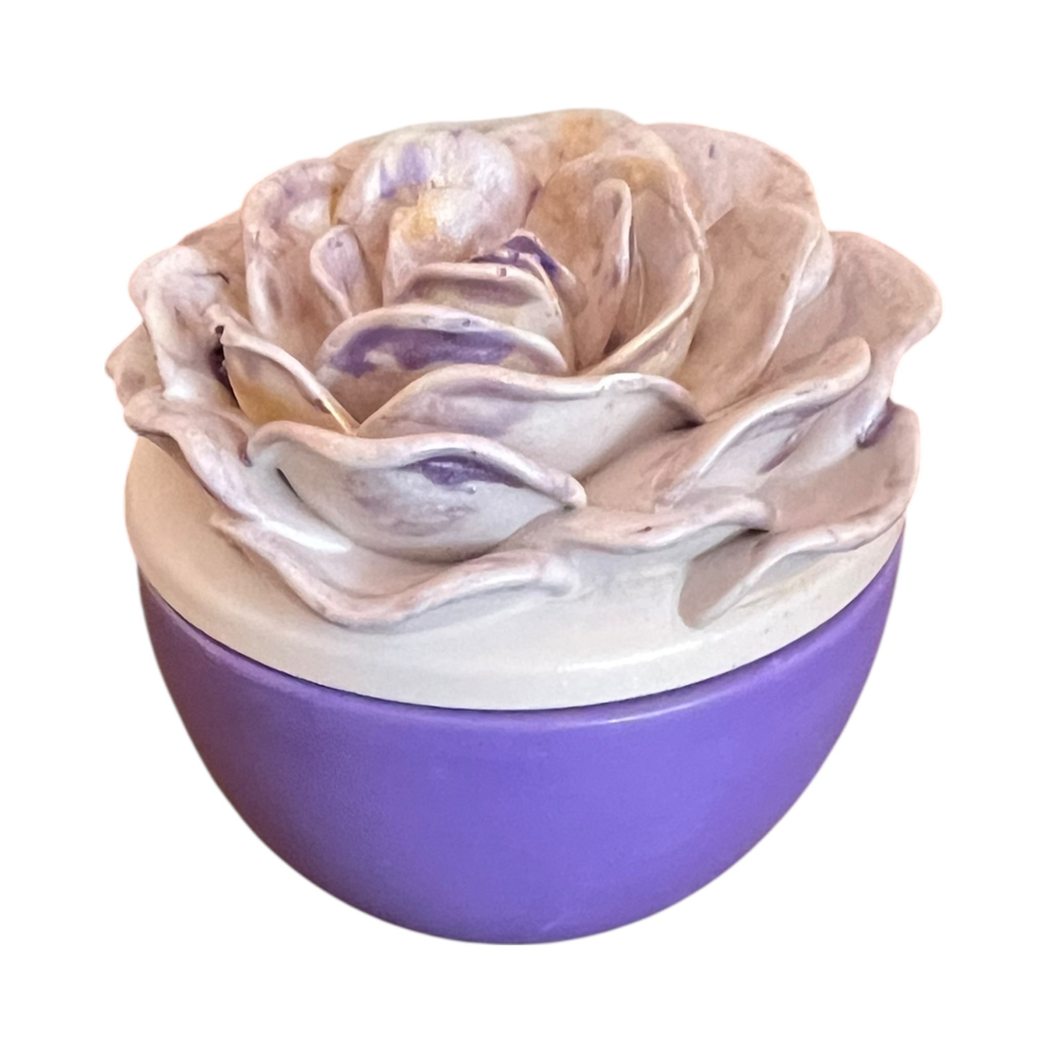 Decorative item with a floral design on top of a purple base