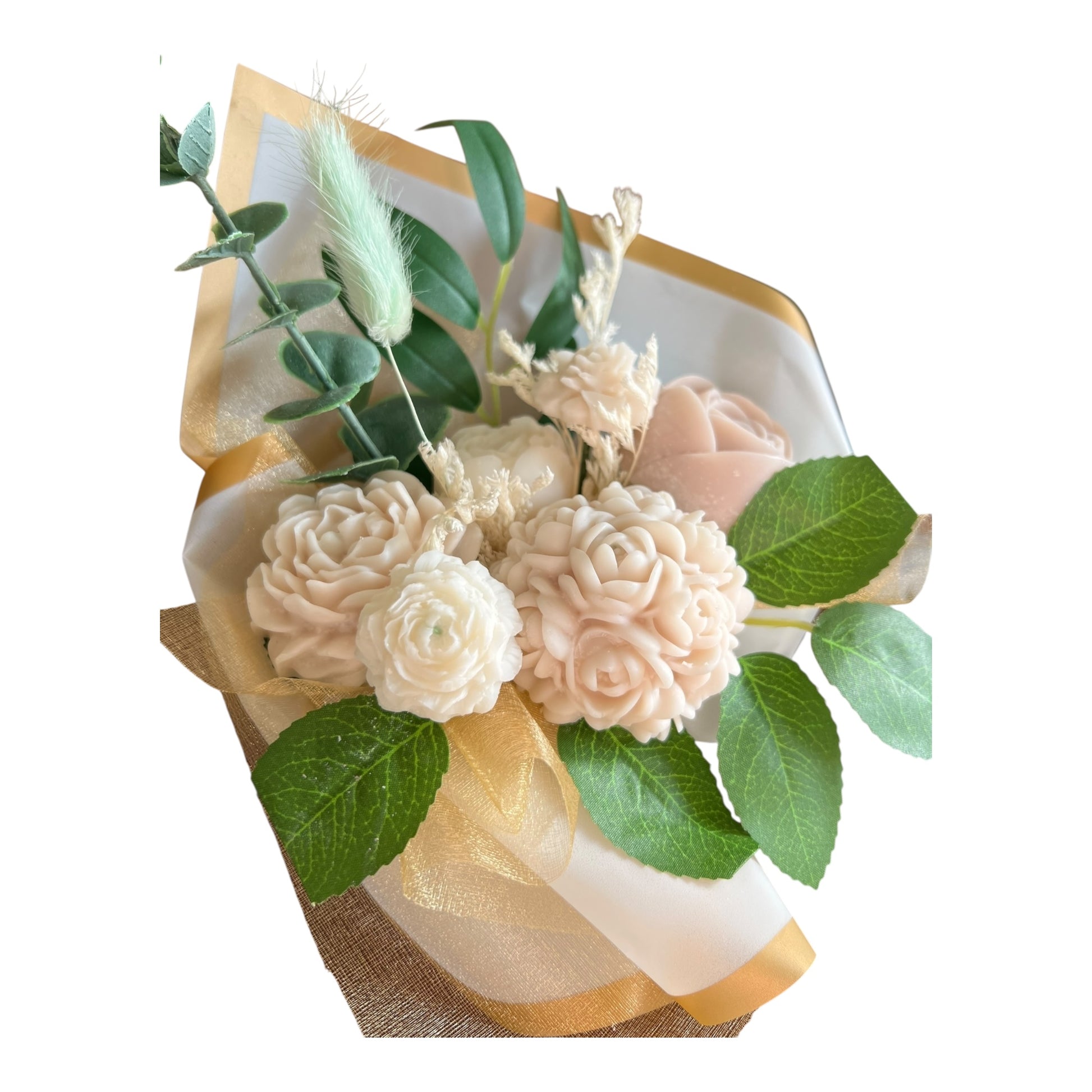 Bouquet of soap flowers with green leaves on a white background