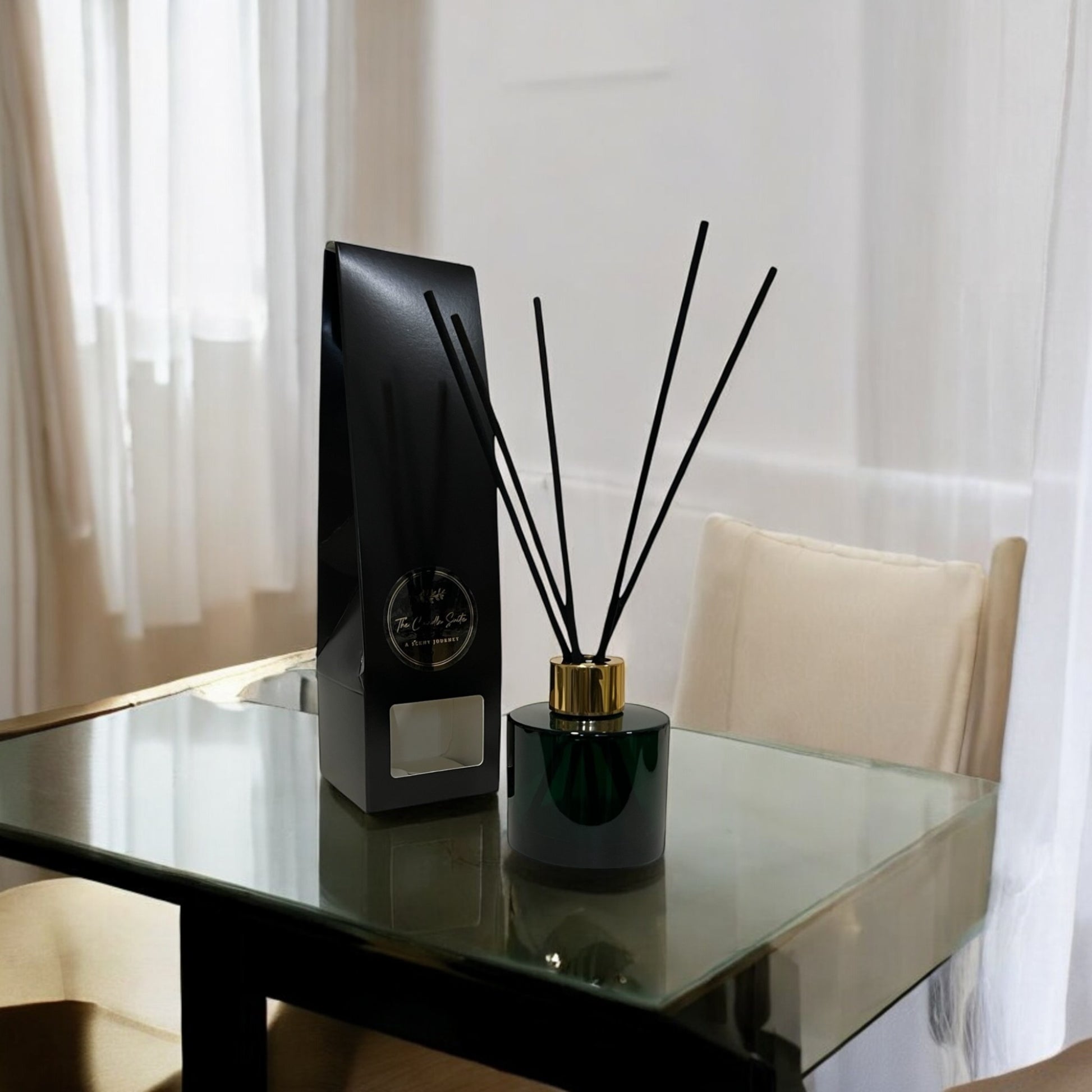 Sophisticated reed diffusers  in sleek dark green glass bottle, hand-poured for premium scent diffusion.