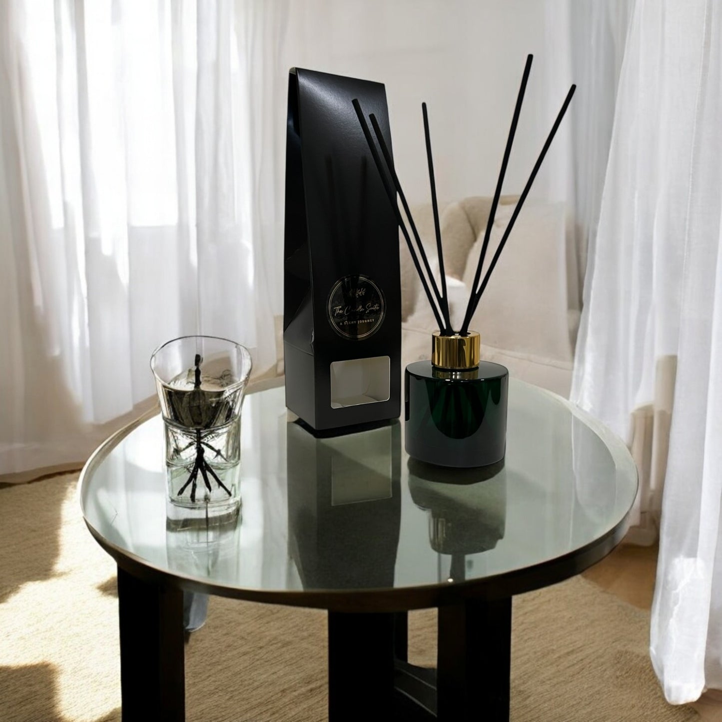 Dark green glass  reed diffuser in a chic, hand-poured design, delivering long-lasting fragrance with style. New home gift